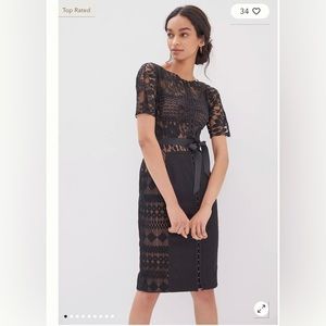 Beautiful black lace cocktail dress. Byron Lars designer.